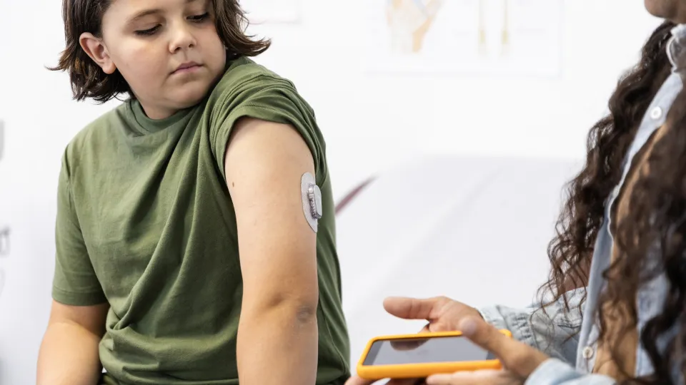 A boy with an insuline pod on his arm. Photo: iStock