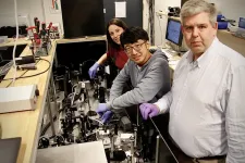 The three researchers in their lab